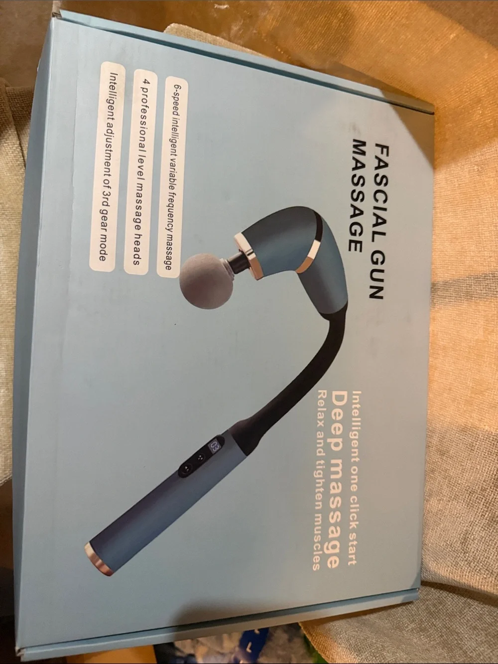 White and Black Fascial Massage Gun with Rose Gold Accents